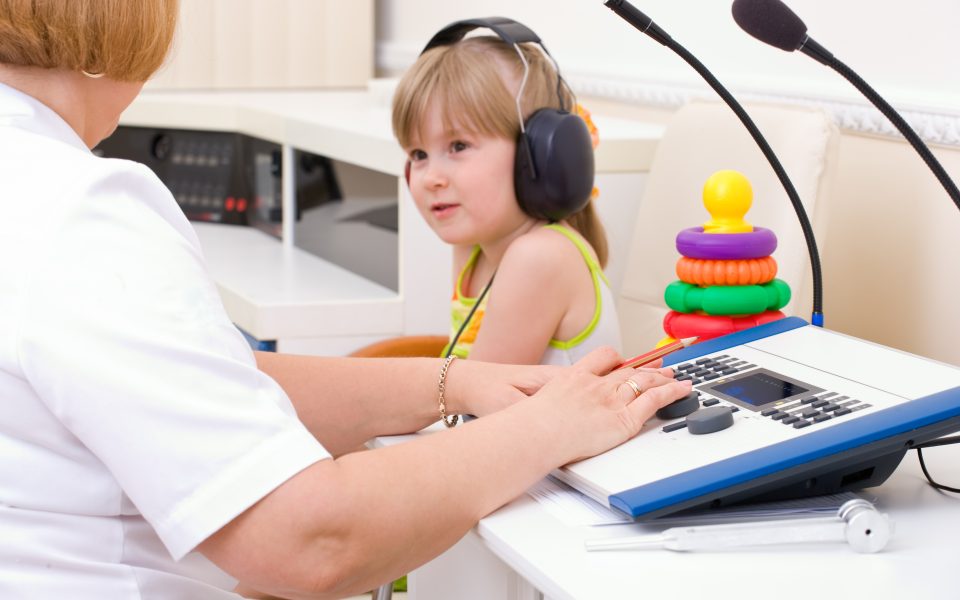 Child with audiologist
