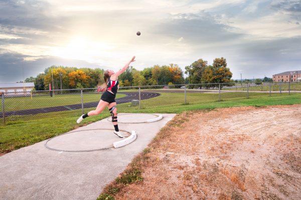 Brittany Devaull thowing a shot put