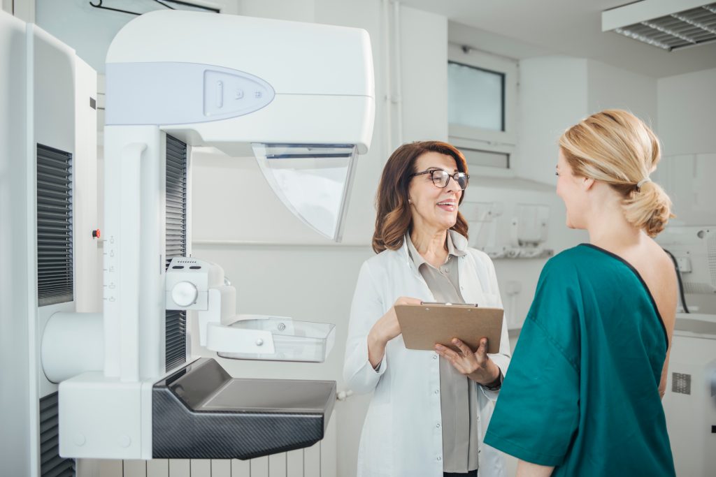 Woman talking to provider about mammogram