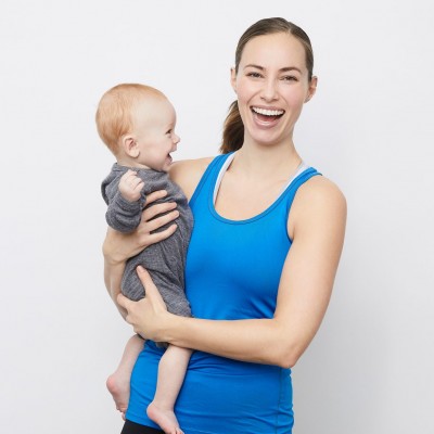 Young mother smiling with baby