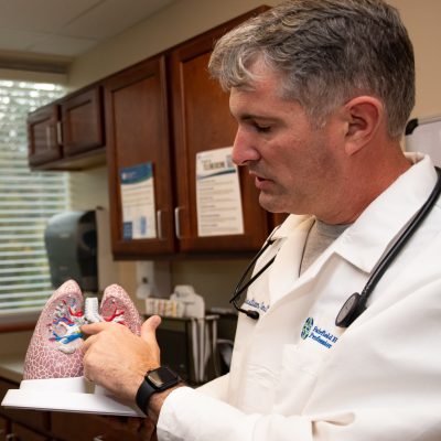 Pulmonologist educating on lung cancer