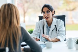 doctor talking to patient